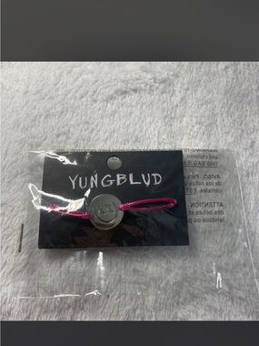 YUNGBLUD Pink Cord Bracelet with Silver 'XXX' Disc